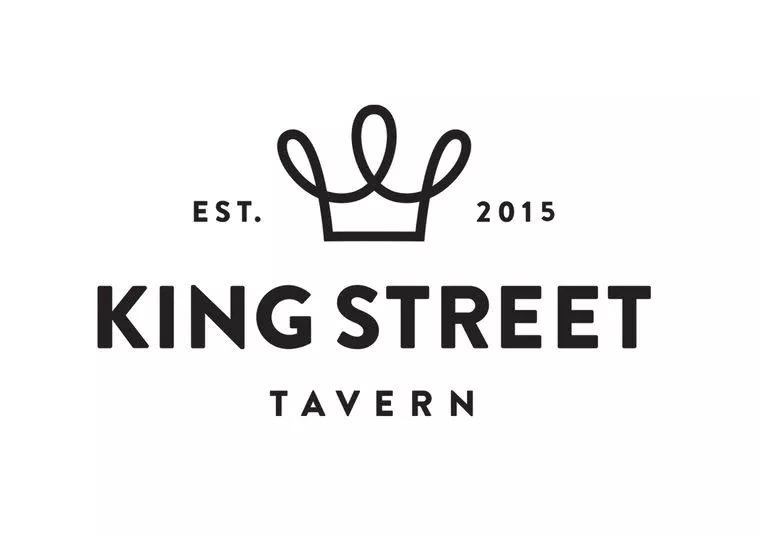 Logo for King Street Tavern featuring a simple black crown above the text. EST. 2015 is written on either side of the crown. The words KING STREET are bold, with TAVERN below in smaller letters.