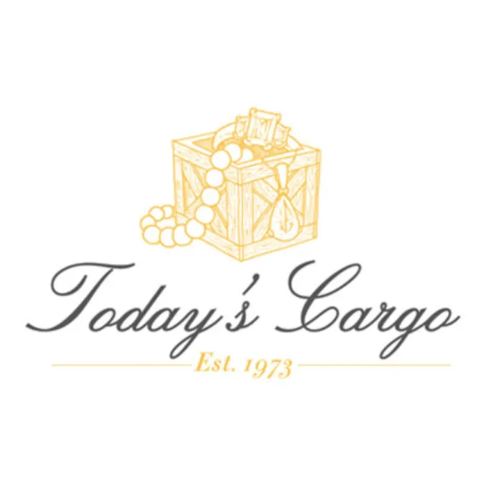 Logo for Today’s Cargo featuring a yellow outline of a wooden crate with jewelry spilling out, above elegant script text reading “Today’s Cargo” and “Est. 1973” in yellow beneath it.
