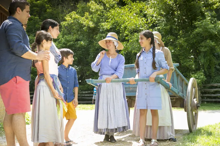 Family posing together at Mount Vernon historic estate grounds