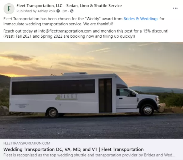 A white Fleet Transportation shuttle bus is parked on a rural road at sunset with fields and hills in the background. The bus features the company logo on its side.