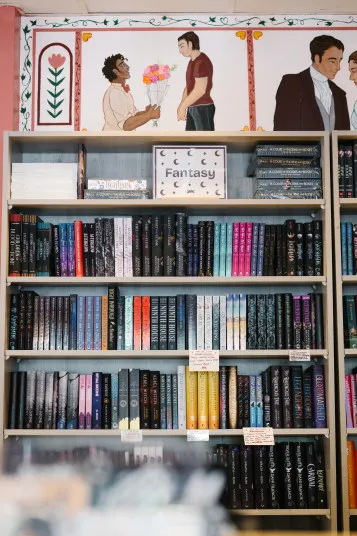 Cozy bookstore interior with shelves of books and warm lighting