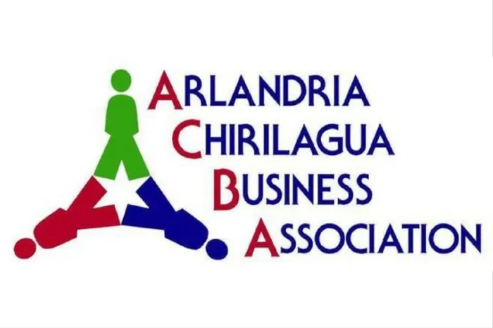 Logo for the Arlandria Chirilagua Business Association featuring three stylized human figures in green, red, and blue forming a triangle, with a white star at the center. Association name is written in blue and red text.