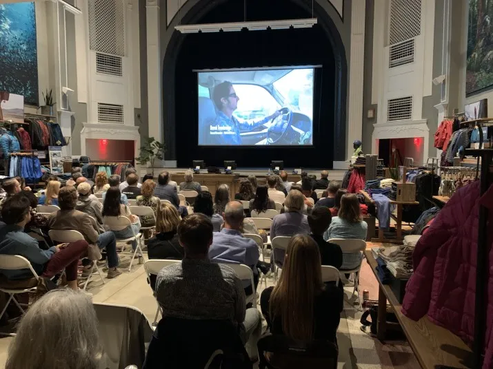 Audience members watch film screening at Alexandria Film Festival theater event