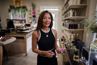 Celthia Corsino inside Bellacara, Old Town Alexandria’s luxury cosmetics boutique.