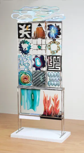 A tall, modern mixed-media sculpture titled 