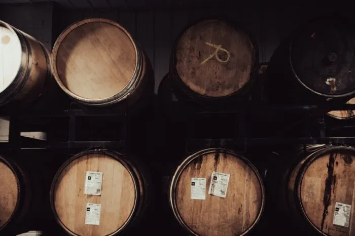 Wooden barrels stacked at Motherwell Distilling Co