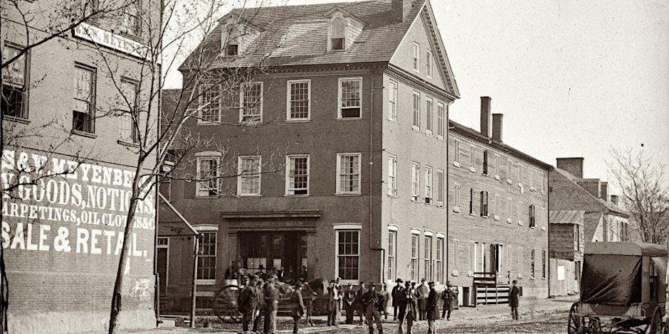 Historic photo of men standing in front of The Marshall House with 