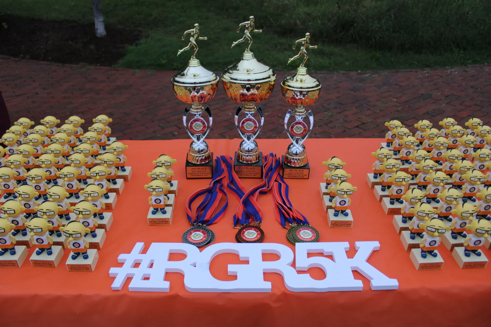 Runners receiving awards at the RUN! GEEK! RUN! 5K event